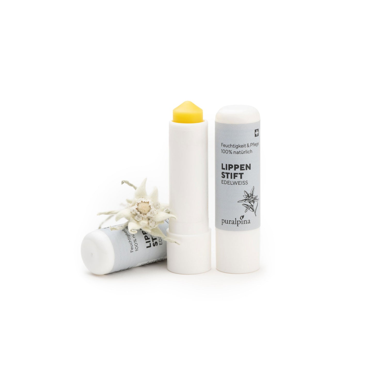 Puralpina Lippenstift Balsam vor weissem Hintergrund