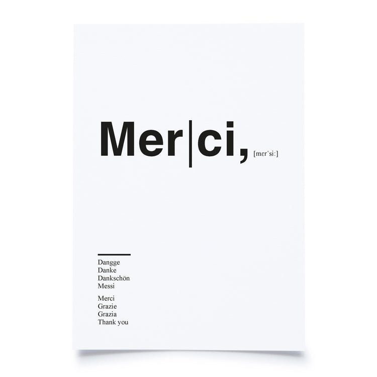 Karte Merci vor weissem Hintergrund