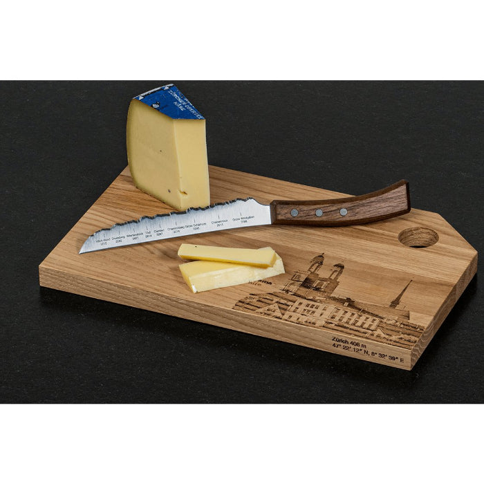 Zürich-City Holz-Schneidebrett Mood Bild mit Käse und Messer auf schwarzem Untergrund.