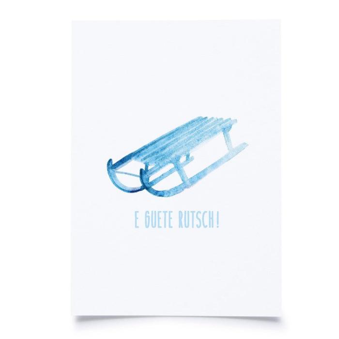 Karte "en guete Rutsch" vor weissem Hintergrund.