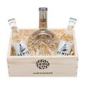 Stadt Land Korb Swiss Gold Gin Geschenkkorb befüllt mit Swiss Gold Gin von der Distillerie Studer, zwei Gents Tonics vor weissem Hintergrund.